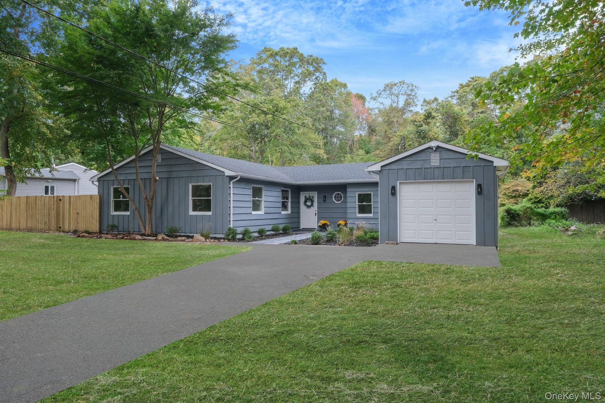Welcome to this stunning renovated 5 bedroom, 3 bathroom ranch style home where modern comfort meets timeless charm.