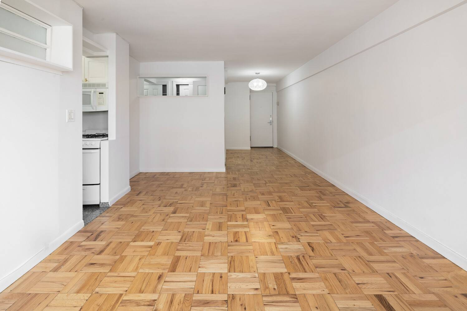 Alcove Studio with Custom Bedroom in a Full Service UES Condop.