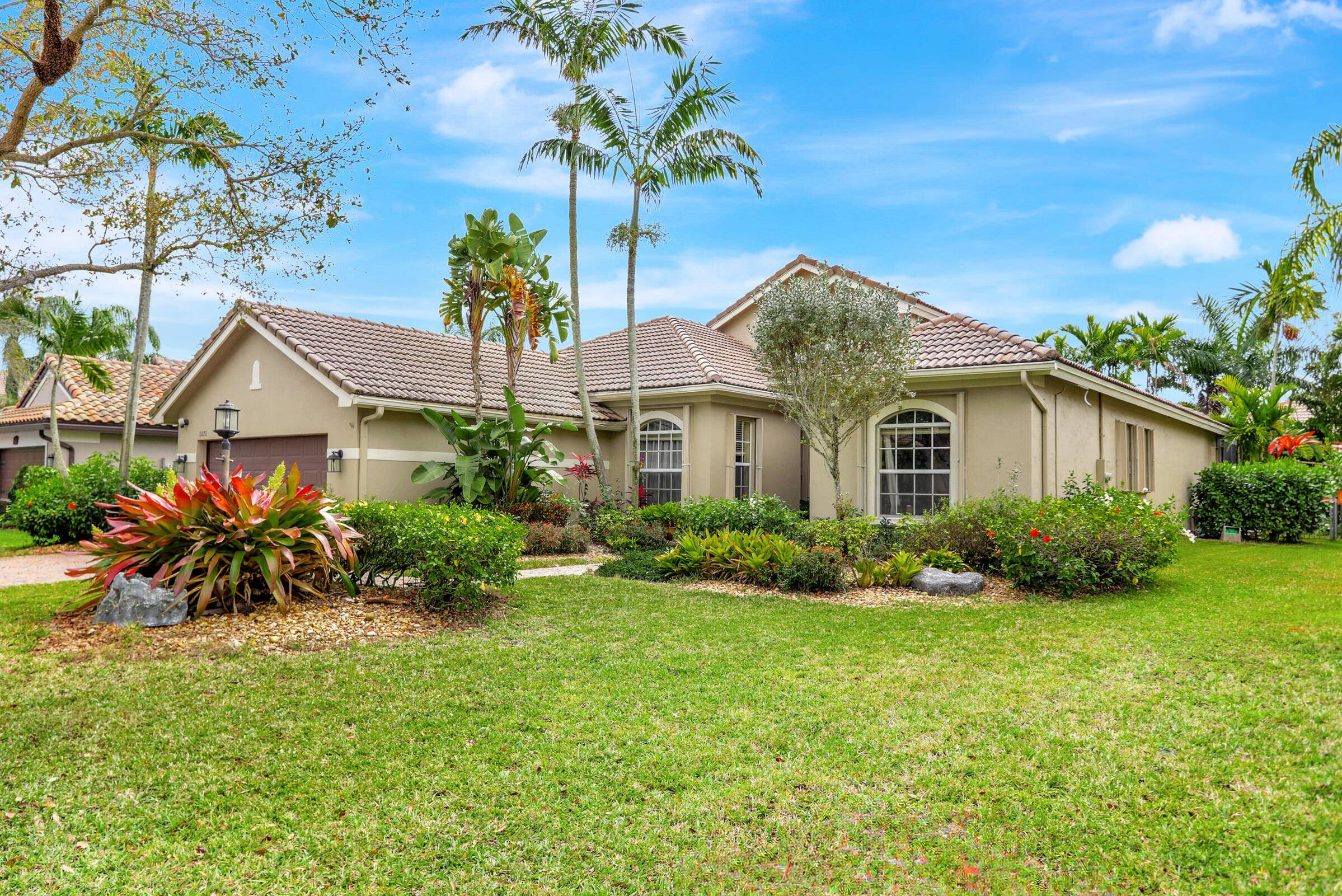 Gorgeous 5 br 3 ba Pool home in the lovely gated community of Parkland Isles.