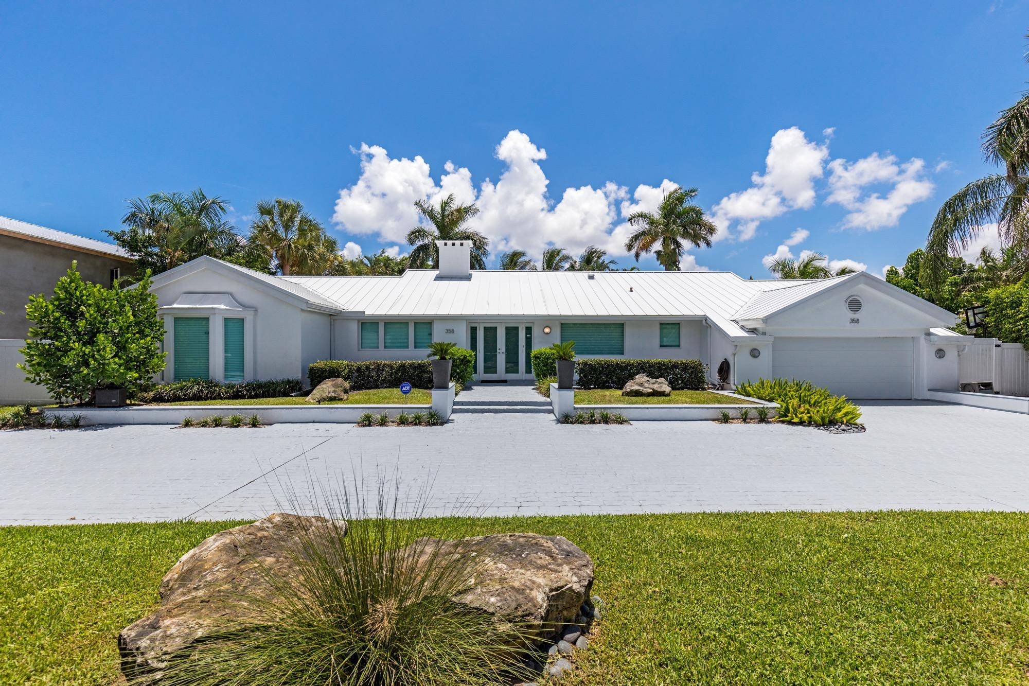 Rare opportunity to live in the exclusive community of Royal Palm Yacht Country Club.
