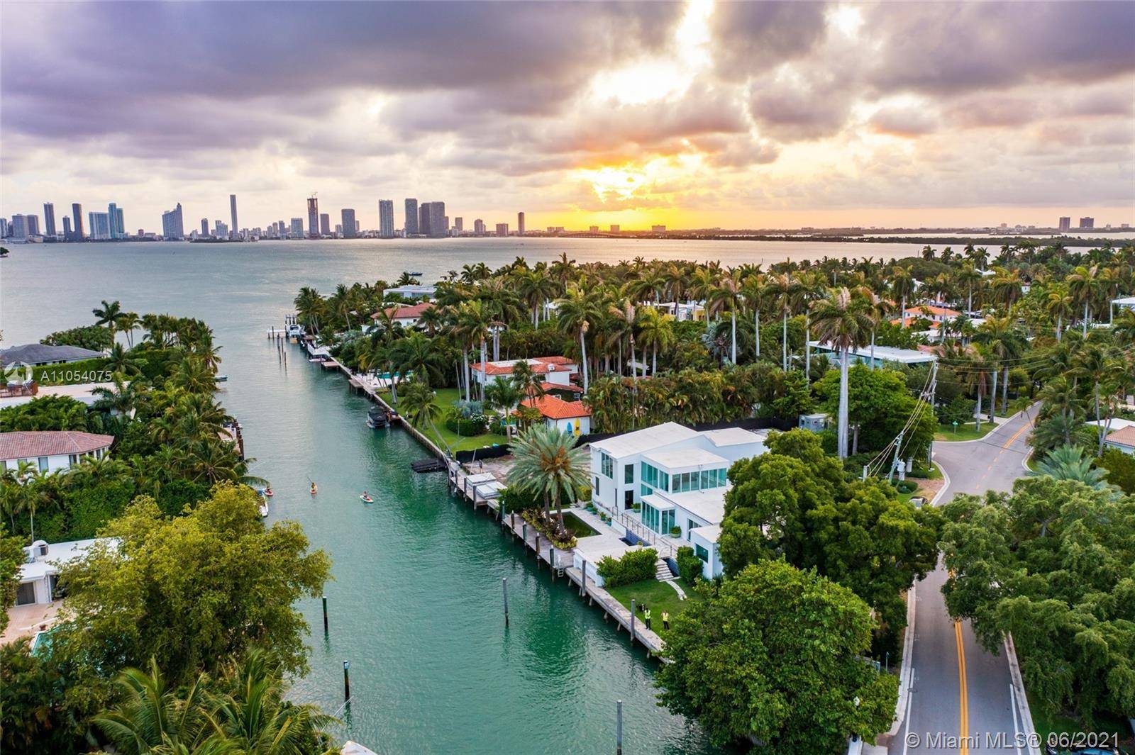 170 ft of private waterfront w direct access to open Biscayne Bay.