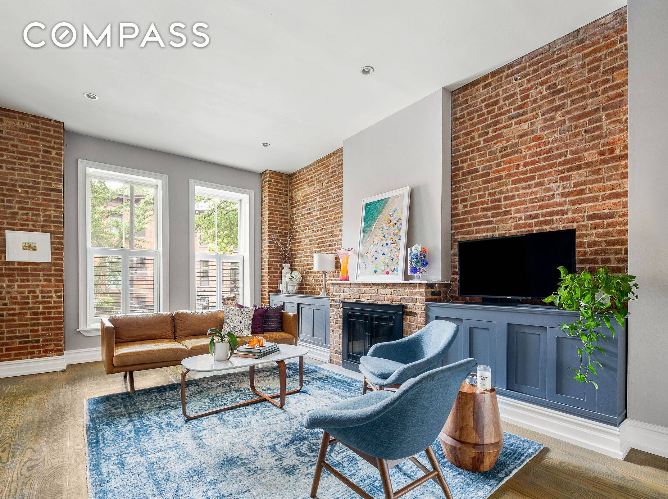 With stunning architectural details, modern updates and an enchanting private garden, this two bedroom, two and a half bathroom brownstone condominium is a rare find in coveted Park Slope.
