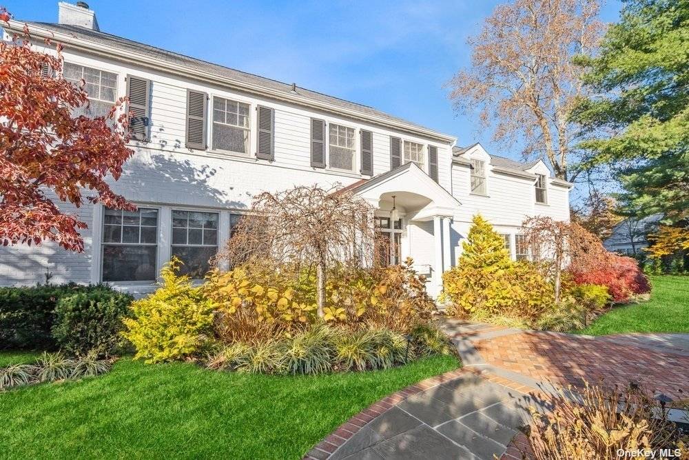 Welcome to this gracious, very large brick center hall colonial in the sought after village of Kensington.