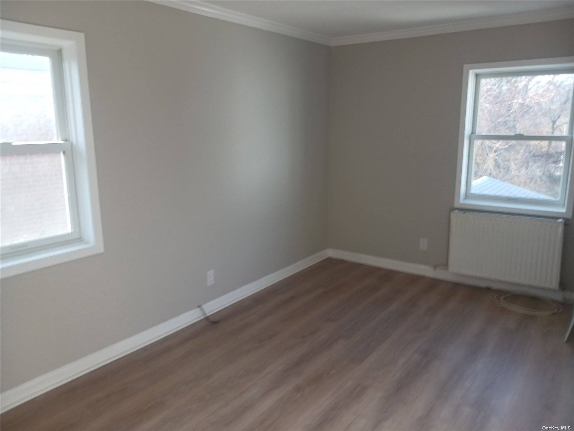 Newly renovated Apt on 2nd floor new appliances master br with own both wood floors throughout walk to Q5 Q85 and LIRR.