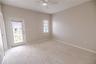 Third floor guest suite with spacious closets and a serene ensuite bath.