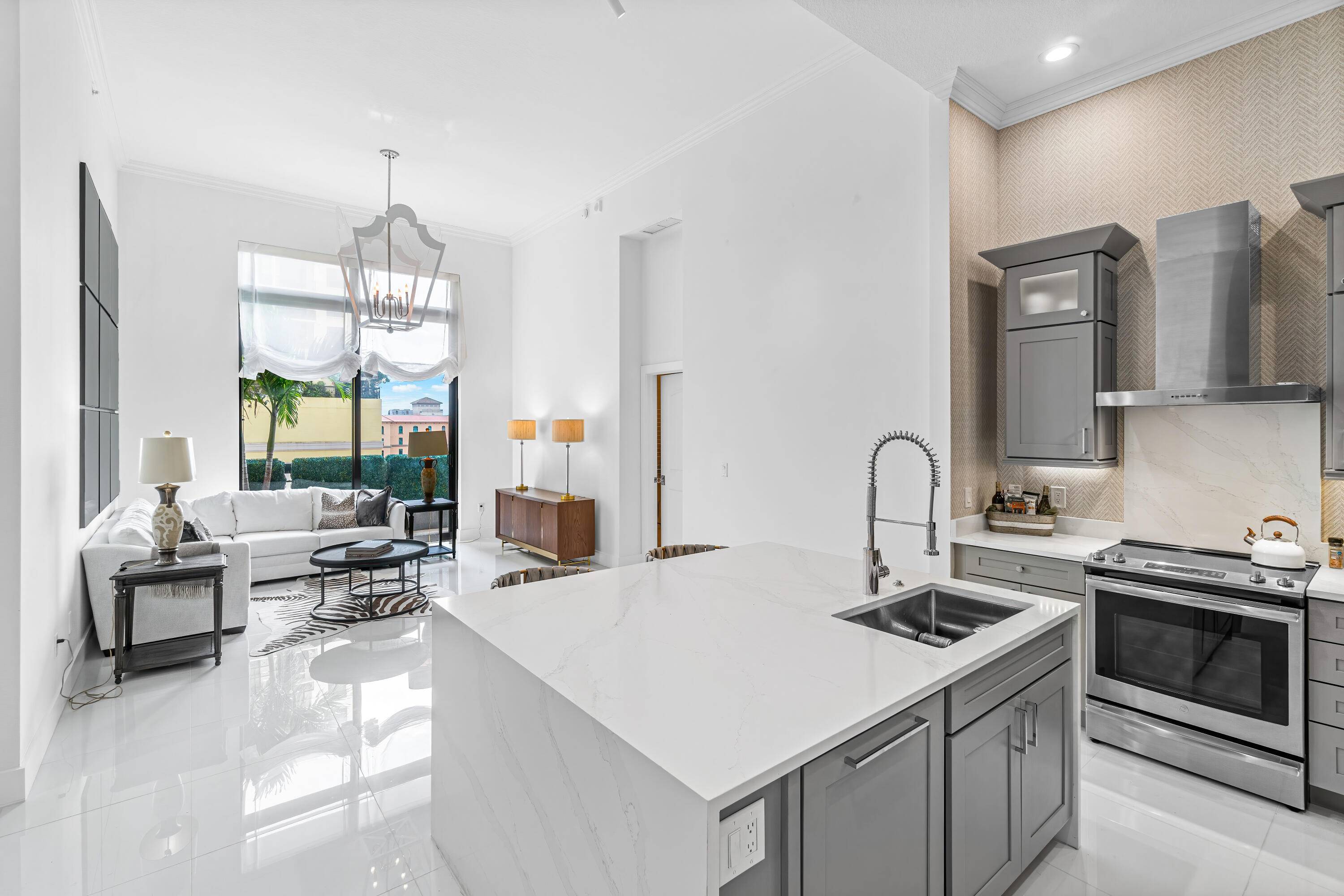 In the heart of downtown West Palm Beach, you'll find a stunning fully renovated condo that exudes modern luxury.