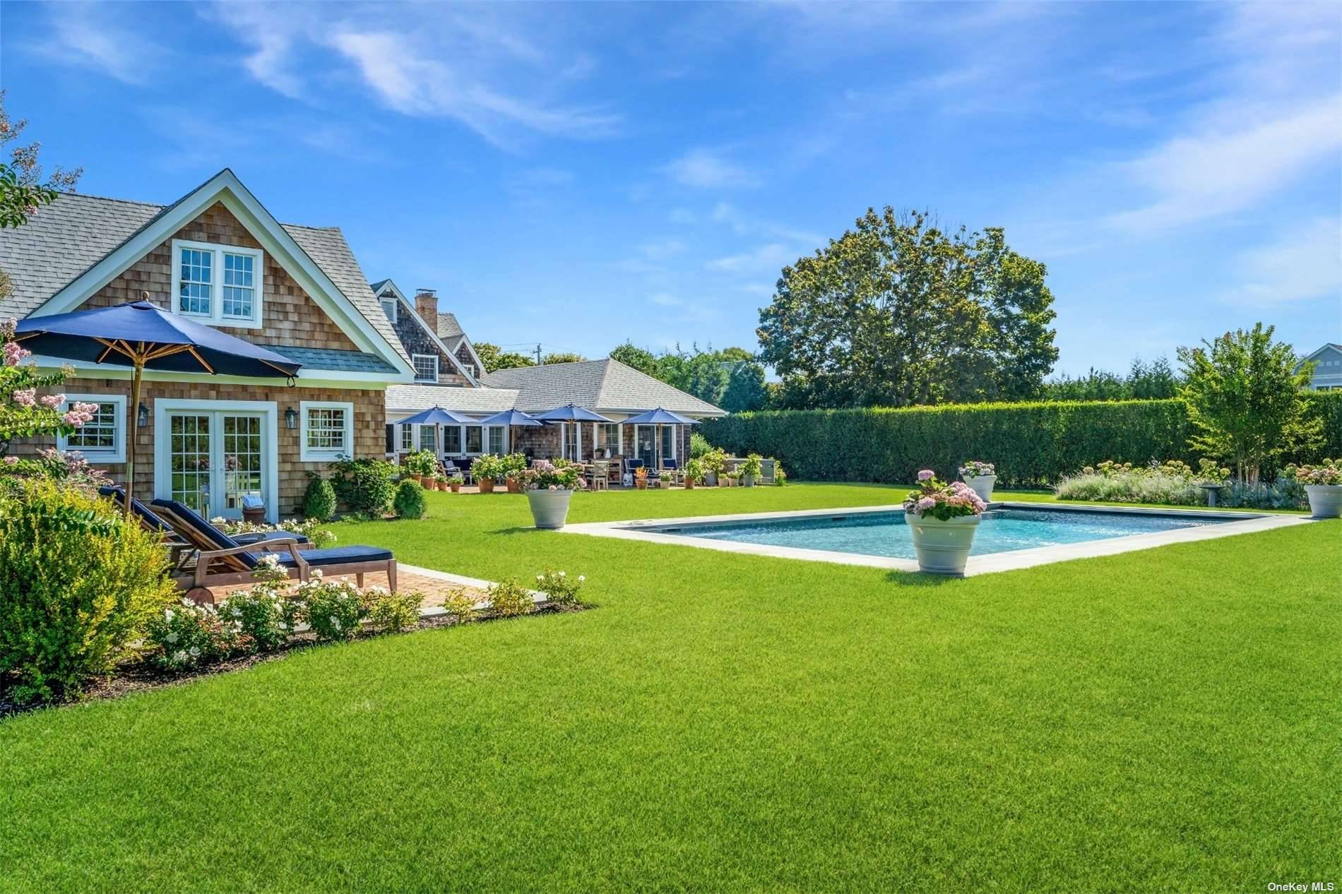 Welcome to Nestledown, a quintessential, historic summer home located in the heart of Quogue Village.
