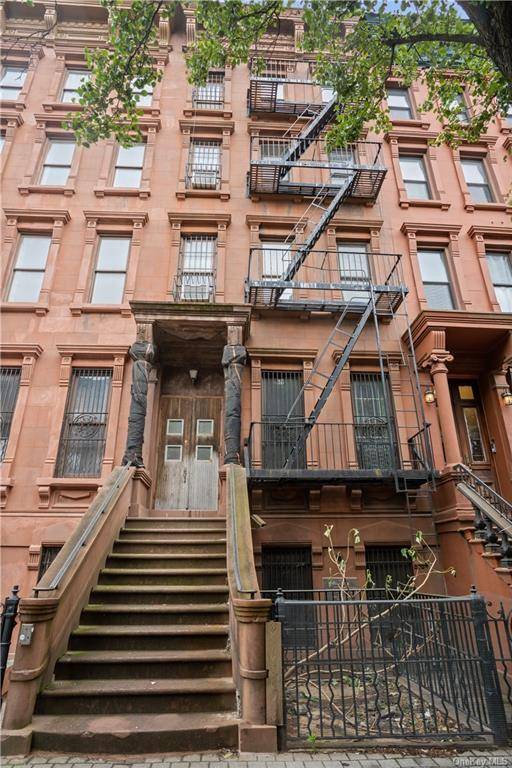 Turn of the century brownstone that presents a unique opportunity for an investor or home buyer.