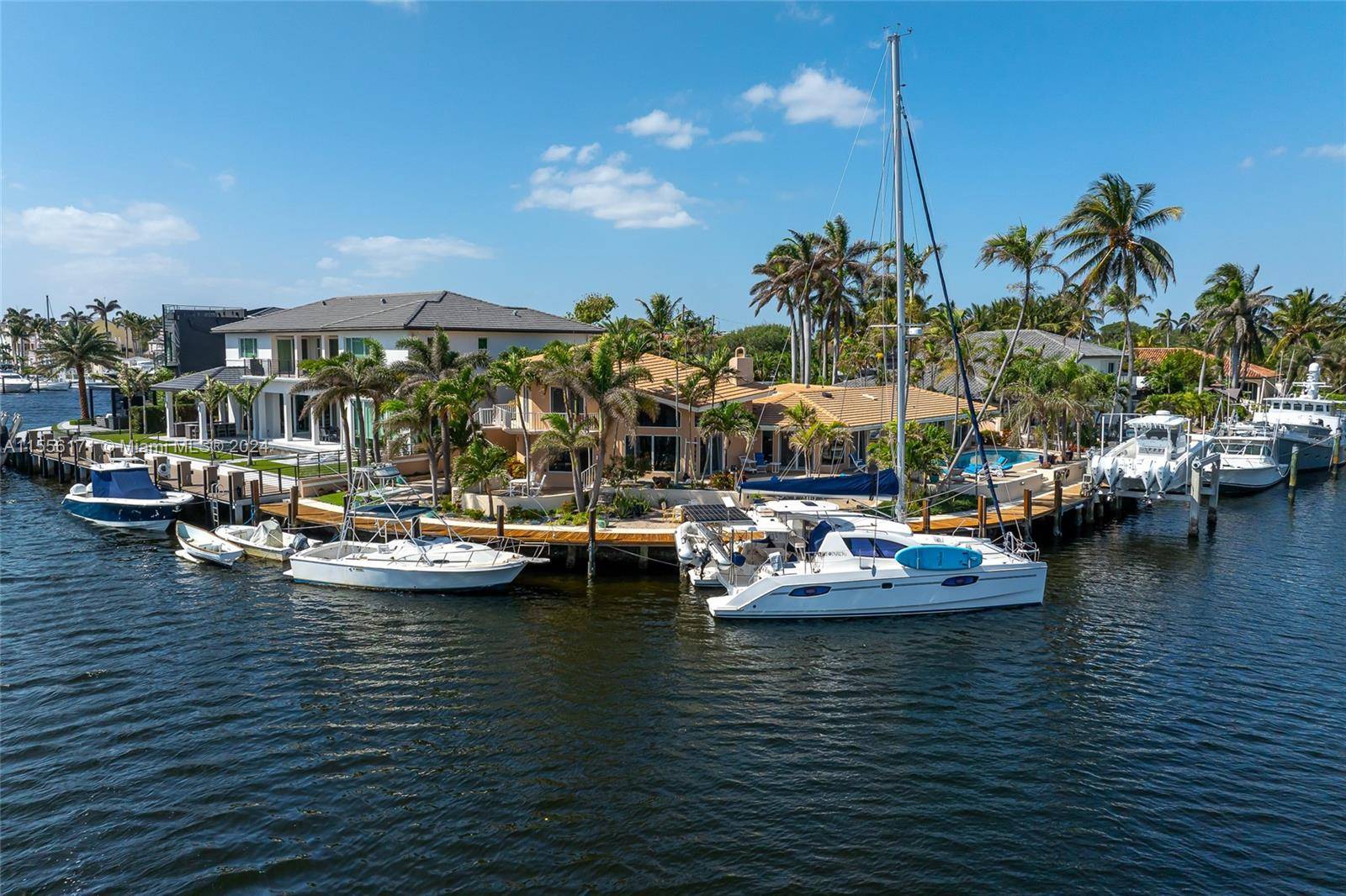 This inimitable east facing waterfront property located in the picturesque community of Lighthouse Point offers unparalleled water frontage and access to Hillsboro Inlet and Marina.