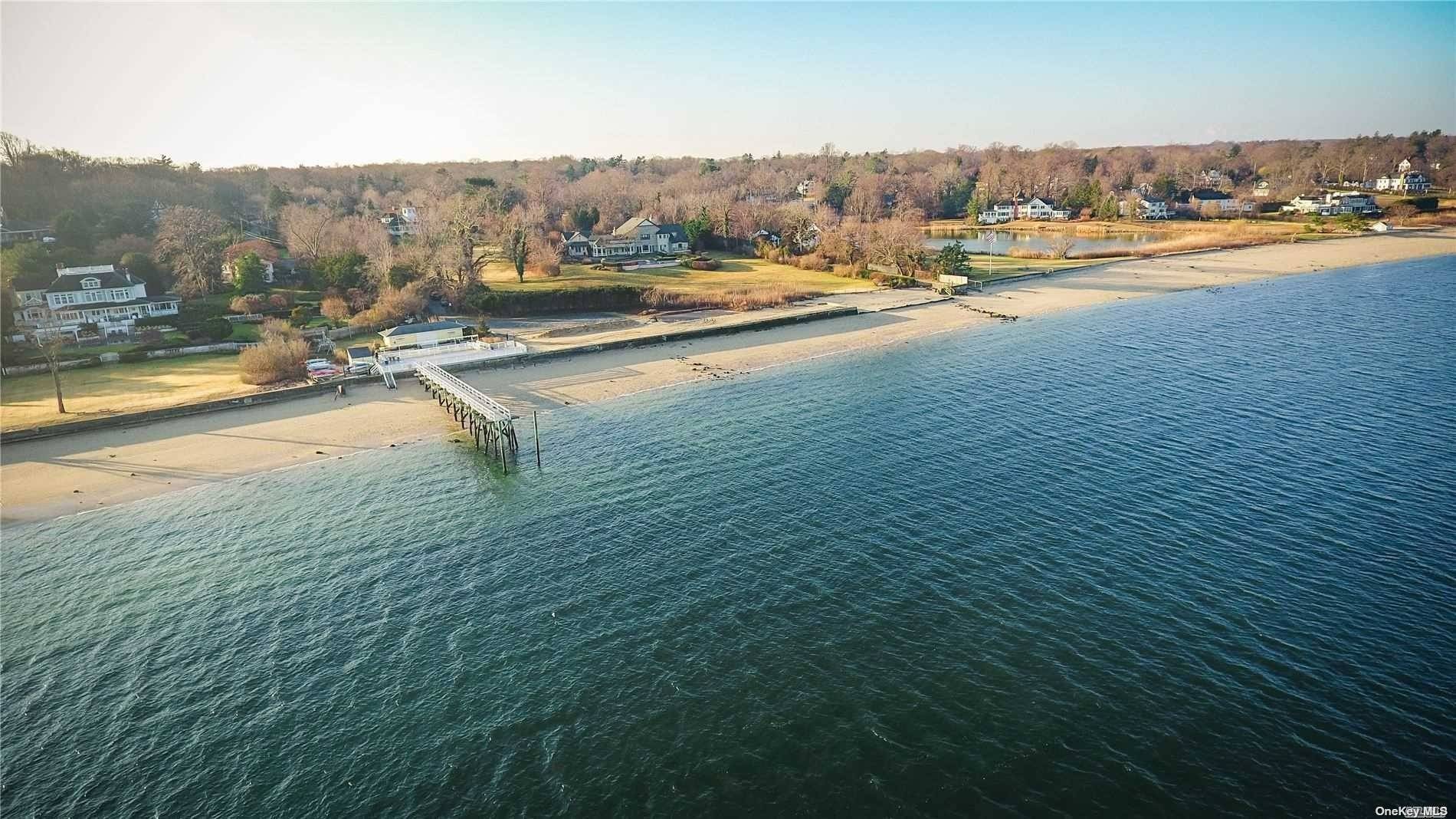 This majestic home situated on nearly 3 acres at one of the areas highest point offering views of Long Island Sound and Connecticut.