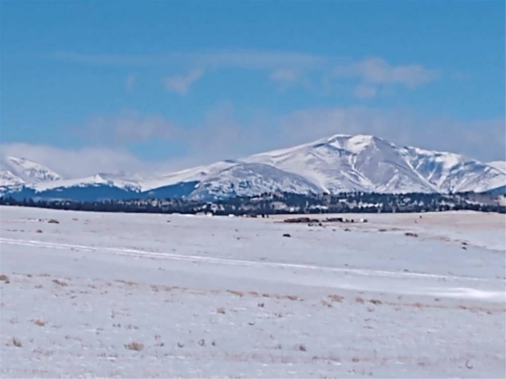 Wow just under 20 acres of gently rolling terrain surrounded by snowy peak views in Hartsel.