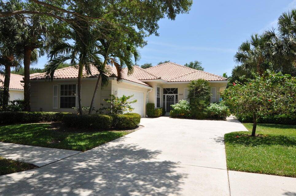 Single family home in the gated community of Oaks East in the heart of PB Gardens.