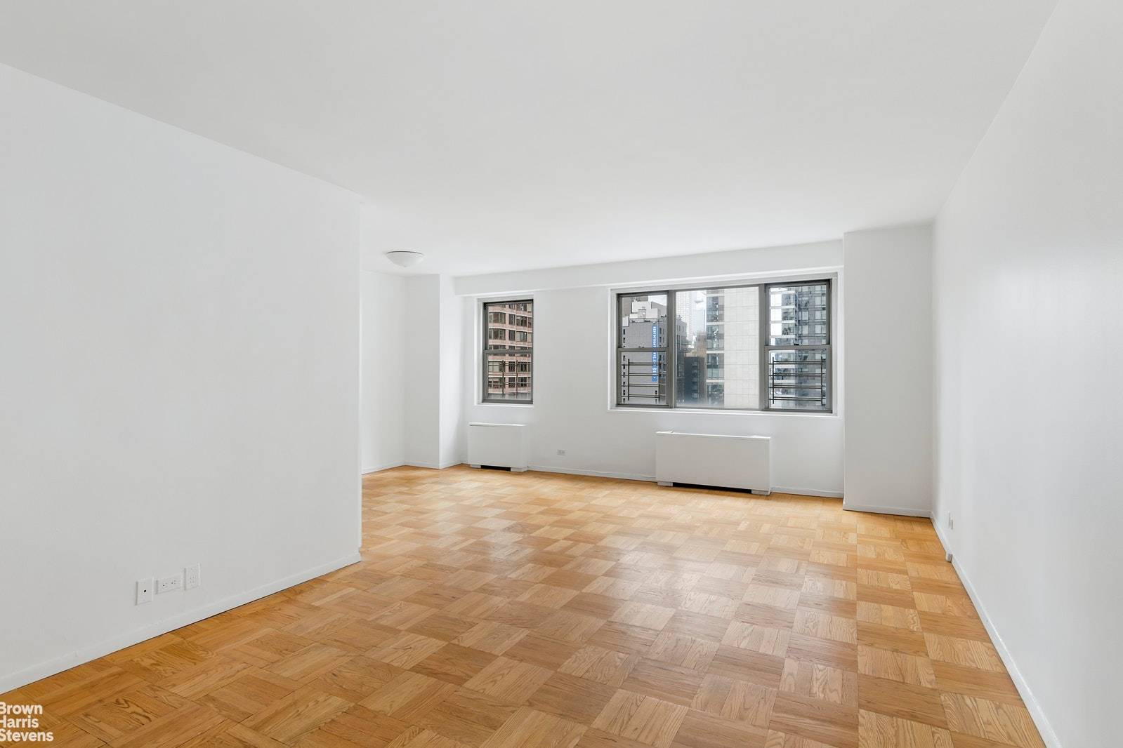 Price Drop High floor convertible two bedroom one bath apartment with Empire State building views.