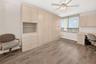 This spacious bedroom has a queen size Murphy Bed - It stays!