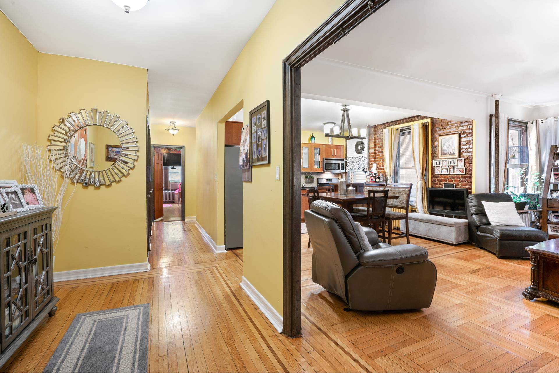 Thoughtfully renovated two bedrooms with direct views of Andrew Freedman home.
