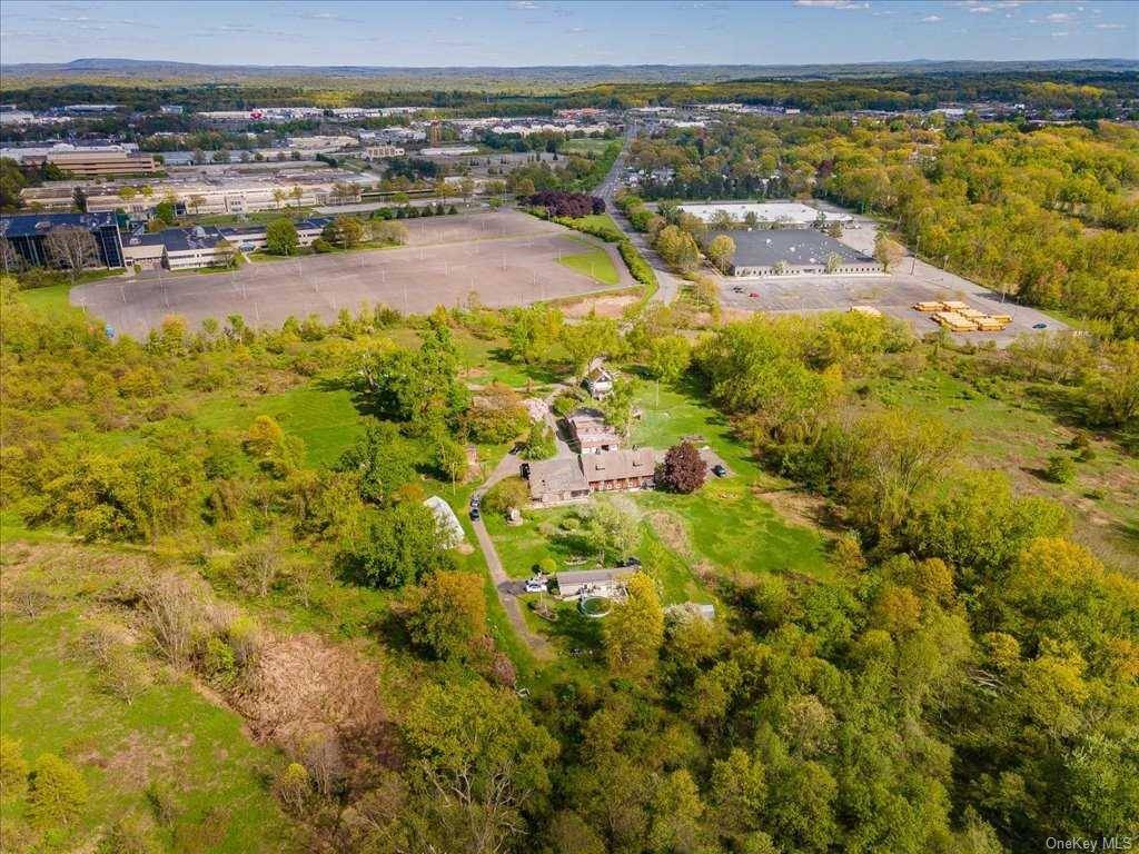 26 acres adjacent to the former IBM and just off I 87 in an active commercial corridor in Kingston, NY.