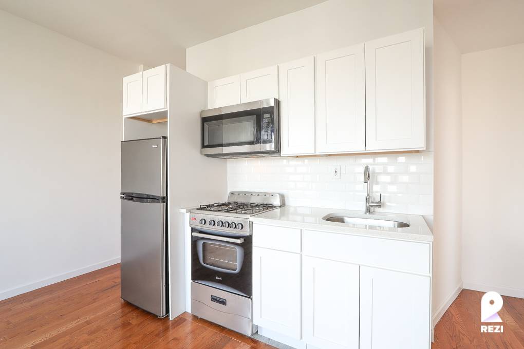 Make this newly renovated sun soaked 4 bedroom near Fordham University your new home !