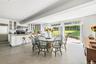 Dining space featuring concrete flooring and recessed lighting
