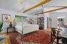 Privately situated guest suite overlooking the gardens