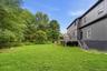 Expansive green lawn providing abundant outdoor space
