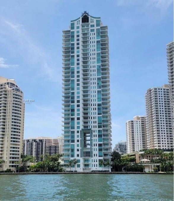 Set in the world class gated island of Brickell Key.
