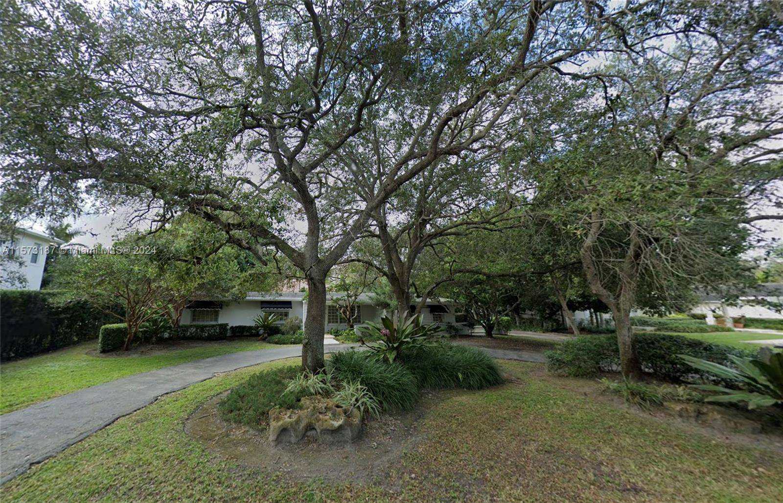 Prime North Pinecrest location amongst multimillion dollar homes on a quiet tree lined street.