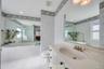 Bathroom with tub and shower