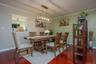 Beautiful dining room with room for all and a pass through to the kitchen for easy serving.