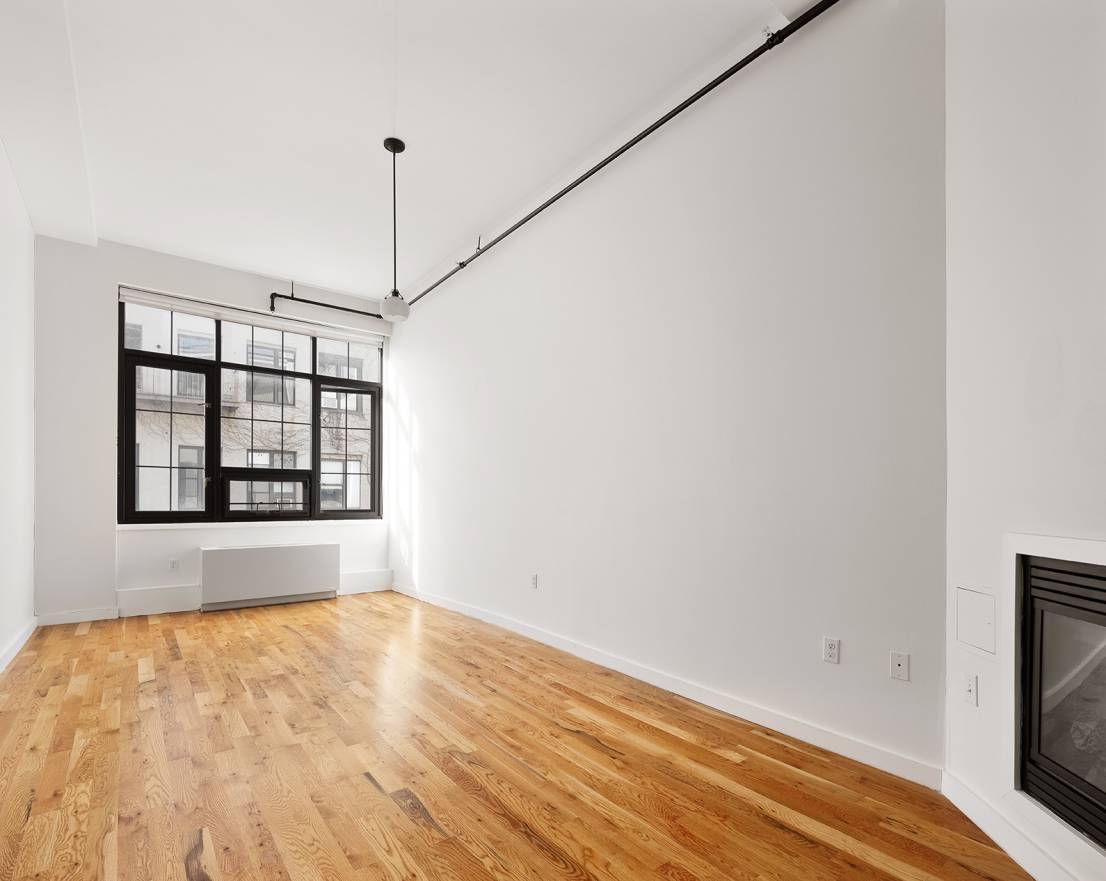 LOFT 428 features vaulted ceilings, great natural light and one full bathroom.