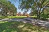 Mature Shade Trees & Circular Paver Driveway