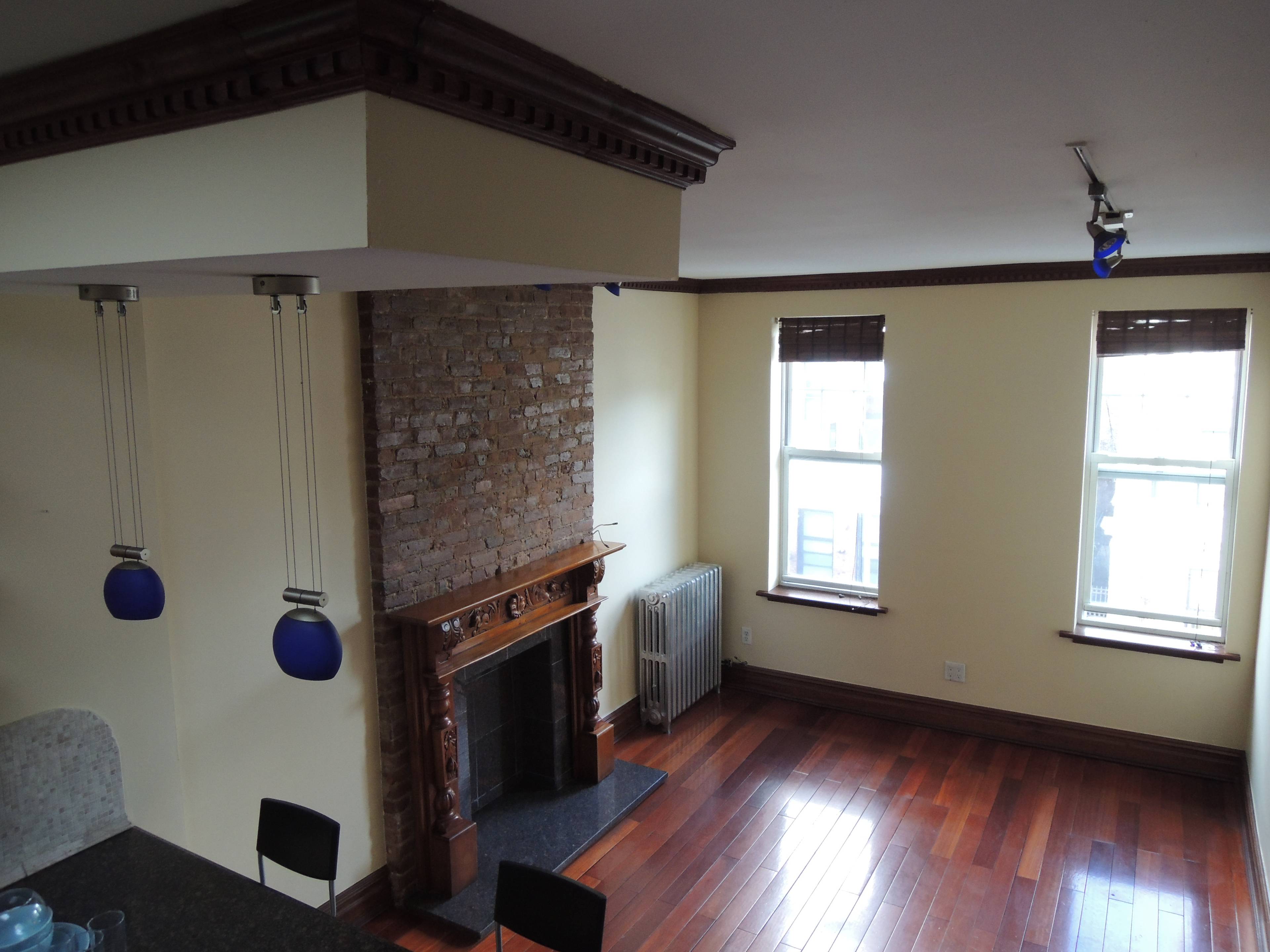 Renovated junior 3 bedroom on top floor of 3 story brick townhouse on the South Slope Gowanus border.