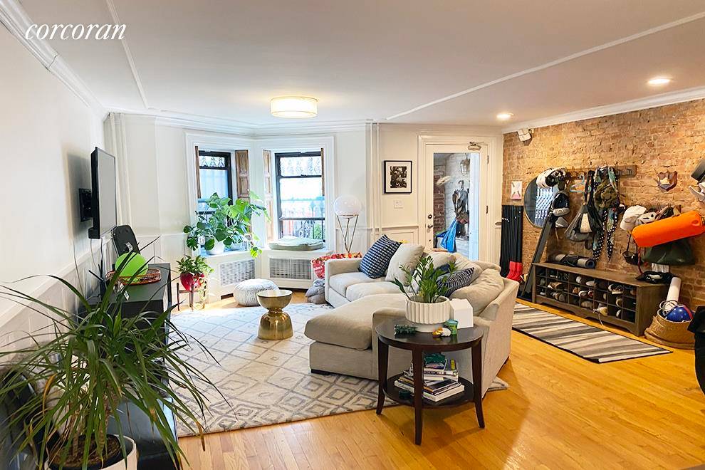 ABSOLUTELY PERFECT Park Slope 2 Bedroom, 2 Bath Triplex with a Huge Private Backyard Spanning nearly 2, 000 square feet across three levels, this lovely apartment exudes townhouse living.