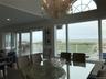 Dining area with a chandelier