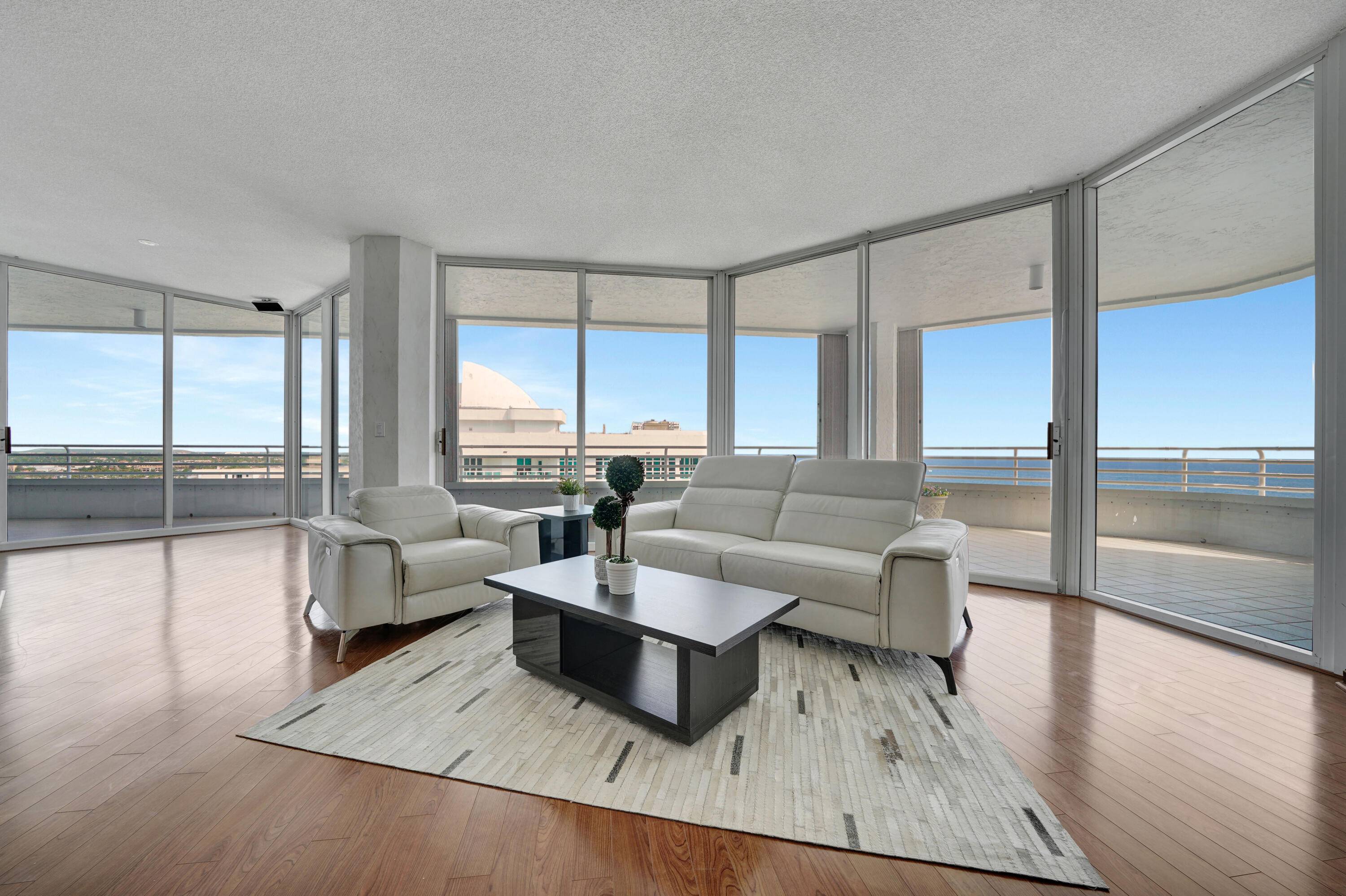 Indulge in modern luxury living within this exquisite penthouse unit perched on the 16th floor, offering breathtaking beach views and refreshing ocean breezes.