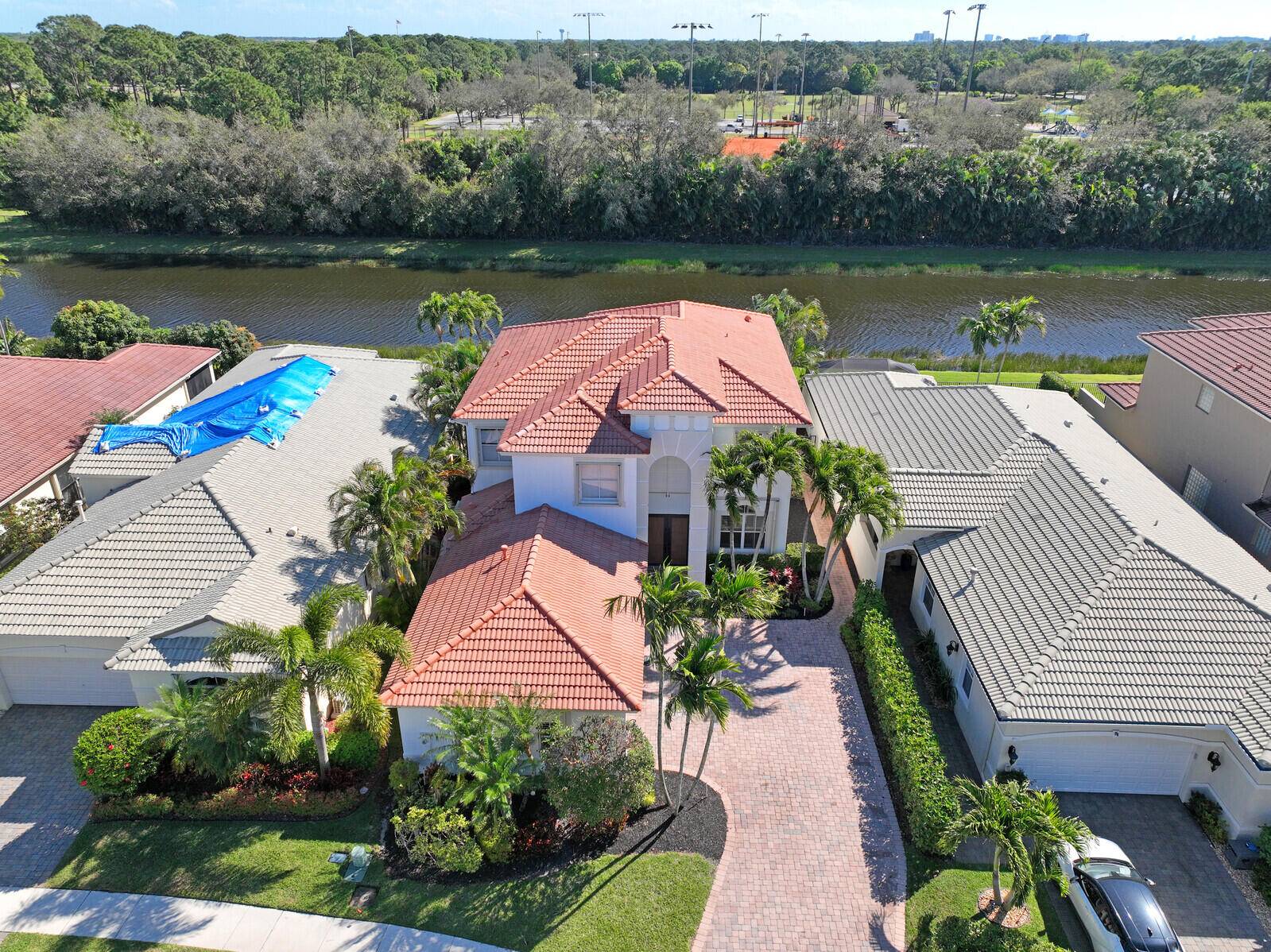 Don't miss your chance to own this Gorgeous and Highly sought after fully renovated Laguna Model on private lake with no neighbors backing your fenced property.