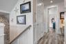 Elevator to the main level and stairway to ground level garage area