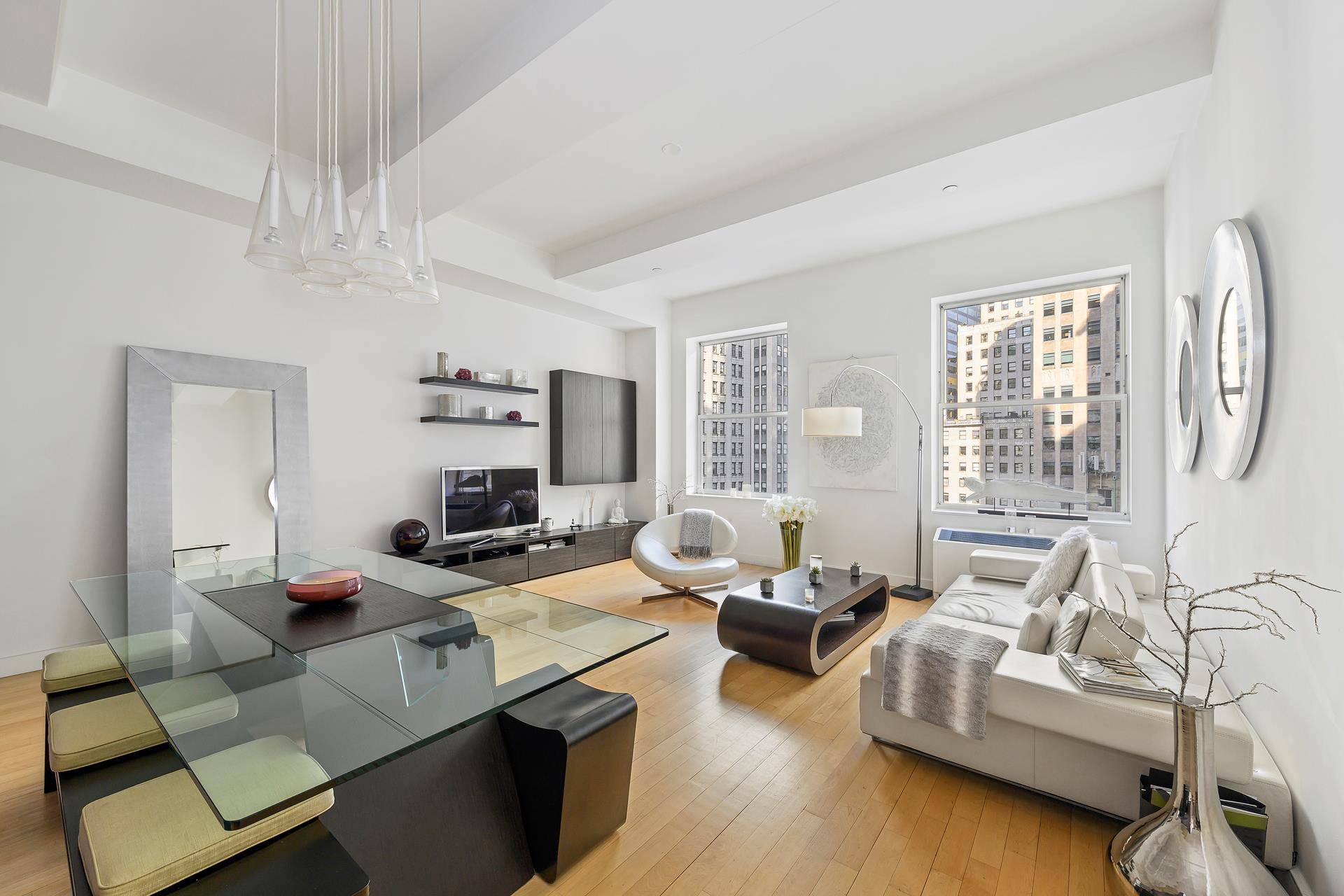 AVAILABLE NOW. Welcome to Downtown by Philippe Starck at 15 Broad Street Phenomenal High Floor Double Alcove Loft Apartment.