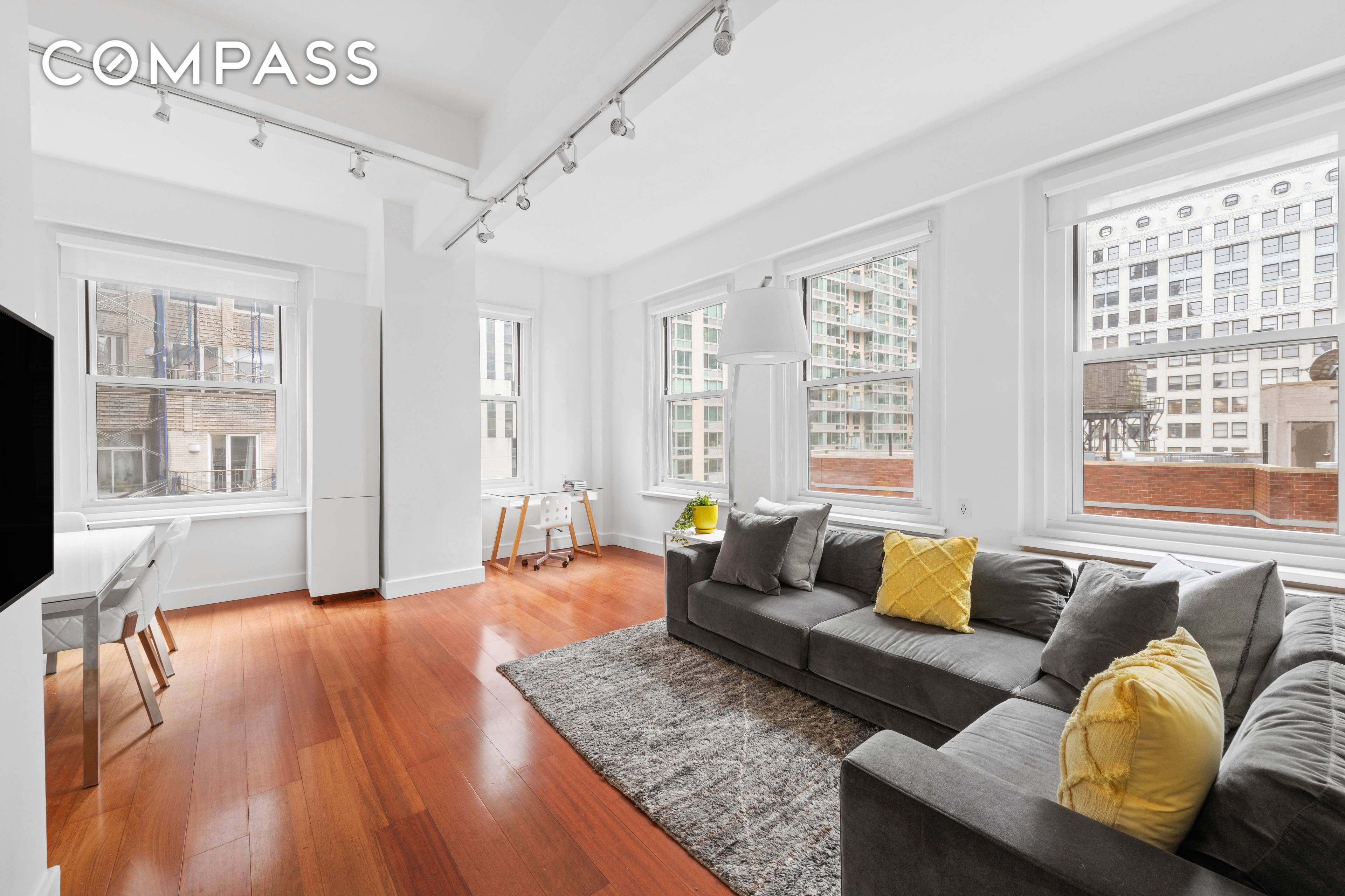 You'll want to move right into this sun splashed, high floor two bedroom, two bathroom corner residence at the South Star, an Art Deco FiDi Condominium.