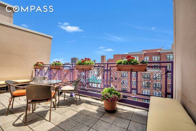 Spacious three bedroom, three bath duplex condo with a planted terrace is awaiting your move in.