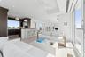 Living area featuring recessed lighting, visible vents, ceiling fan, and plenty of natural light