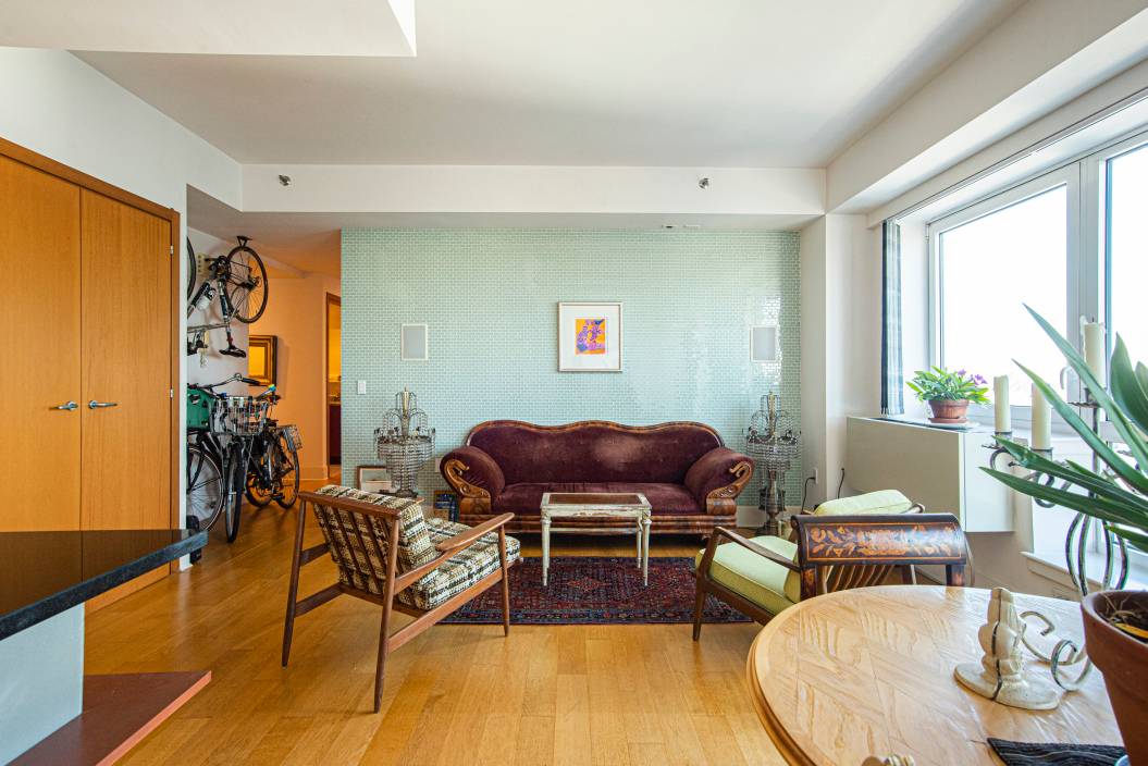 With a prime location in a luxury high rise just footsteps from the Williamsburg ferry stop, this immaculate two bedroom, two bath condo combines sweeping views of the East River ...