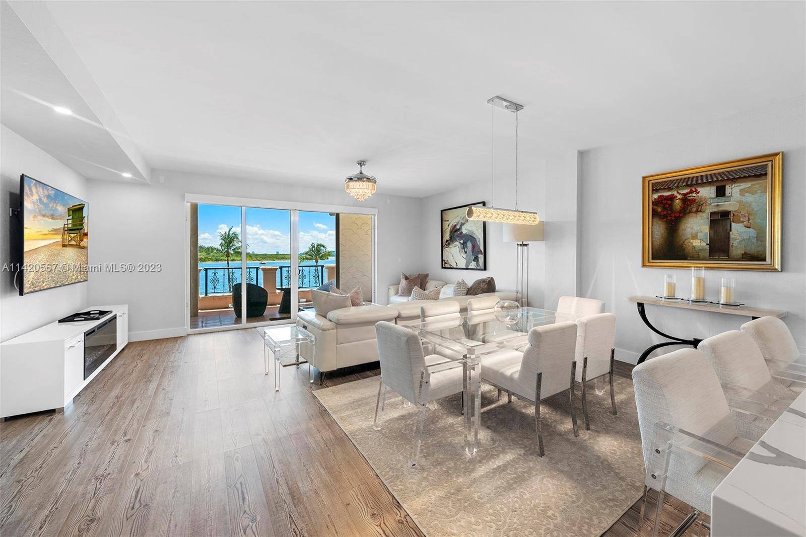 EXPERIENCE FISHER ISLAND LIVING AT ITS FINEST IN THIS SPECTACULAR BAYSIDE VILLAGE 3RD FLOOR UNIT.