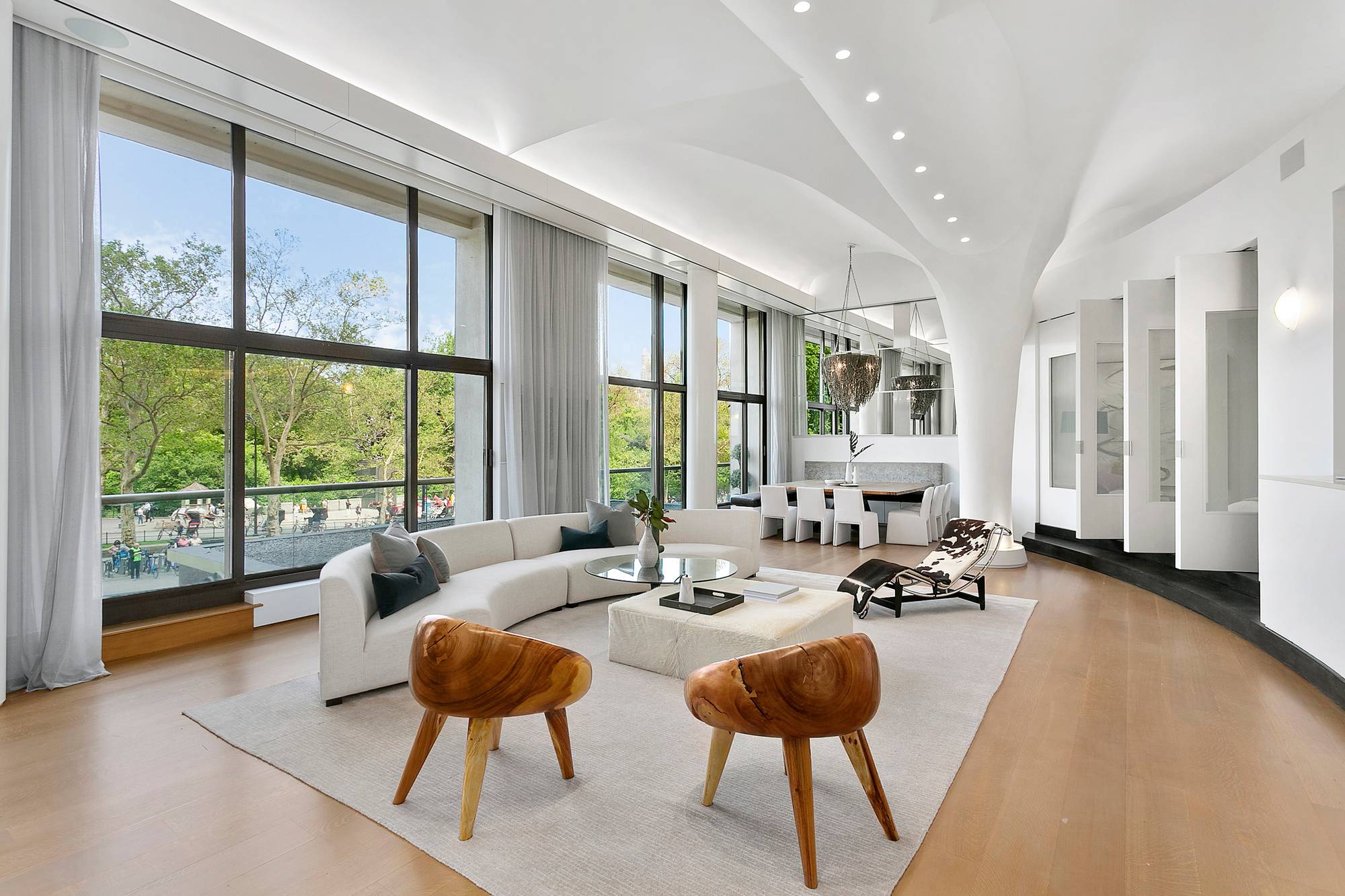 Formerly the grand ballroom of the Barbizon Plaza Hotel, this stunning residence features 50 linear feet on Central Park with nearly 3000sf of living space, plus an additional 175sf planting ...