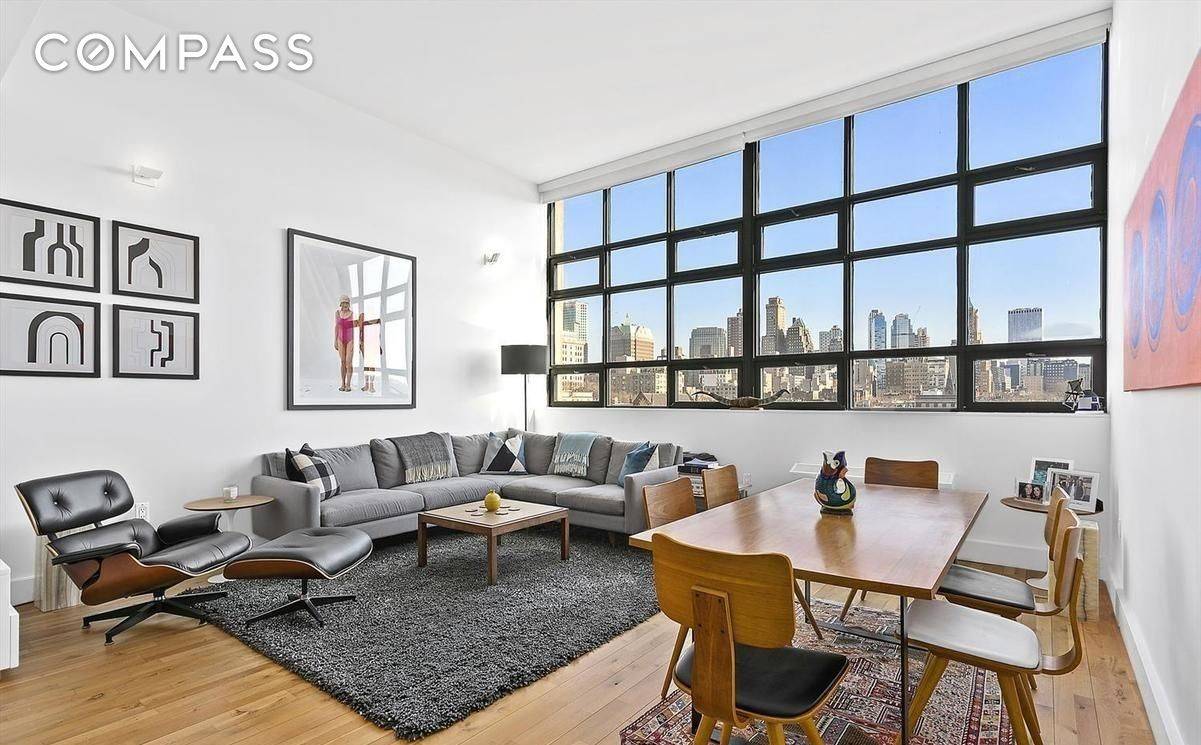 Beautiful 899 SF home office as the bedroom stunning bathroom apartment boasting 13 soaring ceilings and enormous windows giving you spectacular views East.