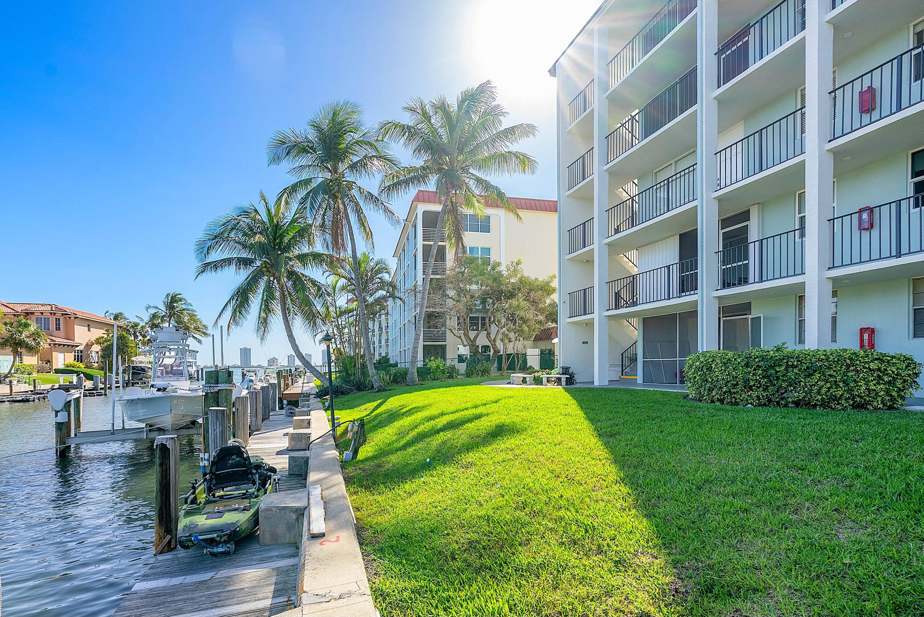 Nestled within a picturesque coastal community, this 2 bedroom, 2 bathroom condo presents an idyllic retreat with a 40' boat slip allowing up to a 36' boat, conveniently located right ...
