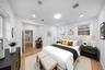 Bedroom featuring light wood finished floors and recessed lighting
