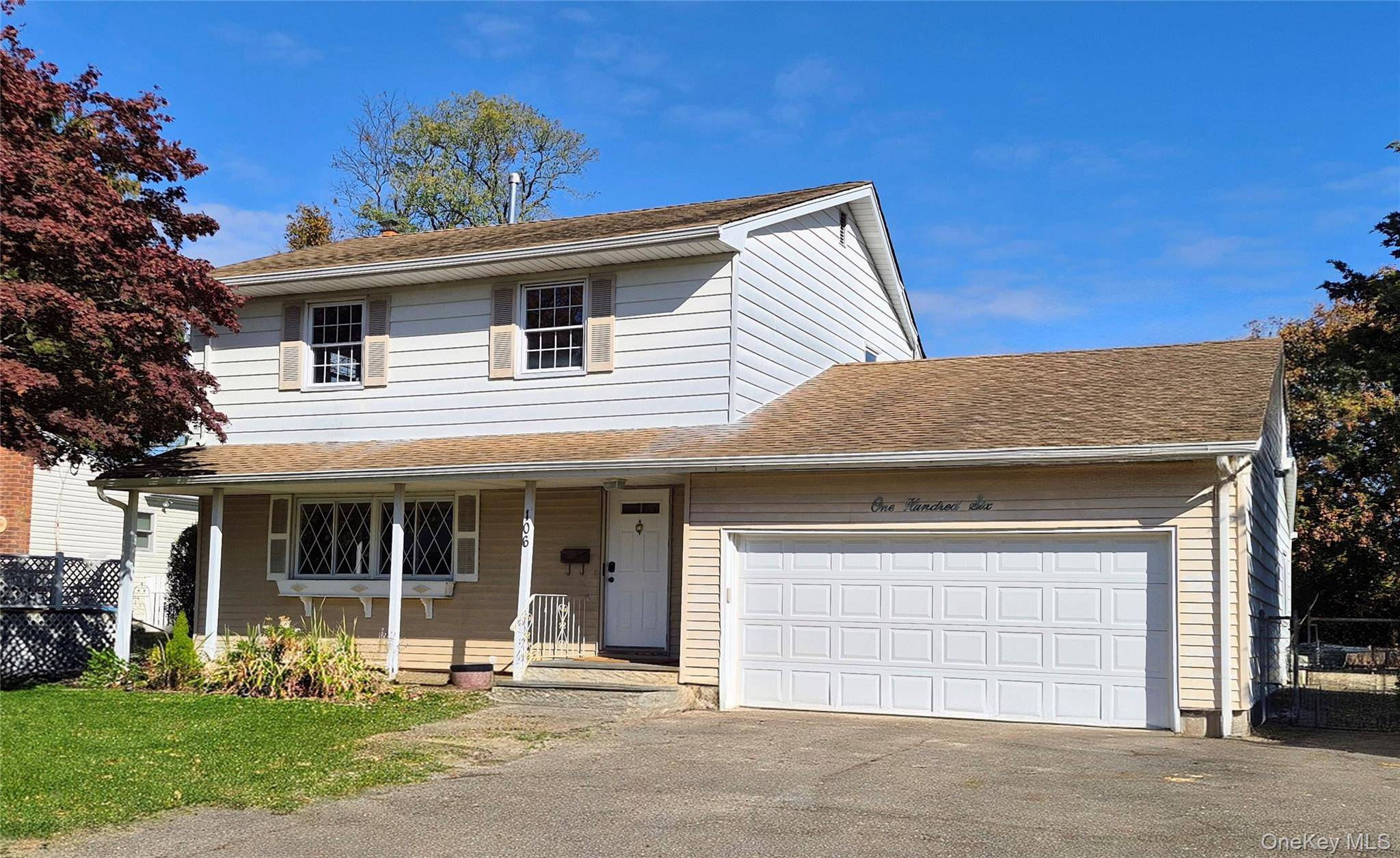 Spacious and well maintained 3 bedroom Colonial style home in the heart of Commack.