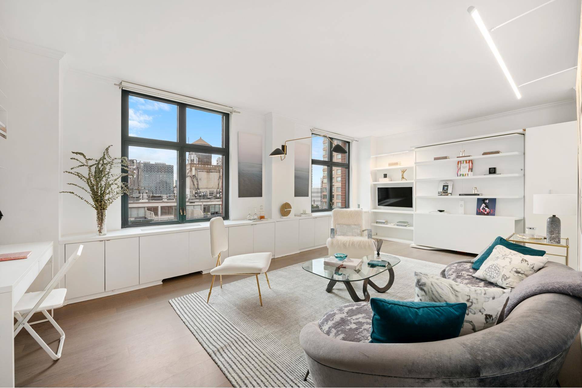 Experience the epitome of refined living in this exquisitely crafted Upper East Side condominium, nestled in the vibrant heart of Lenox Hill.