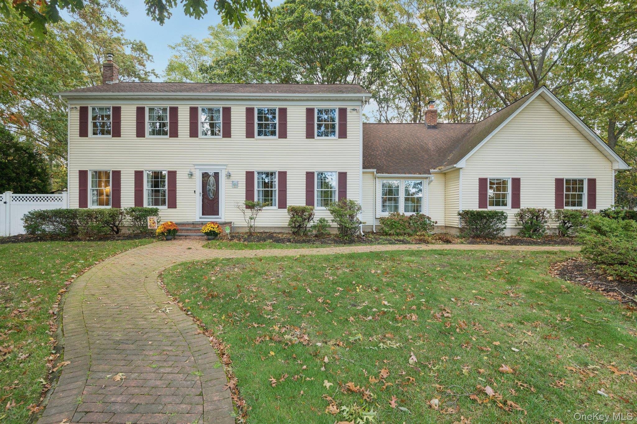 Set on a serene tree lined street, this classic five bedroom center hall Colonial is a true reflection of pride in ownership.