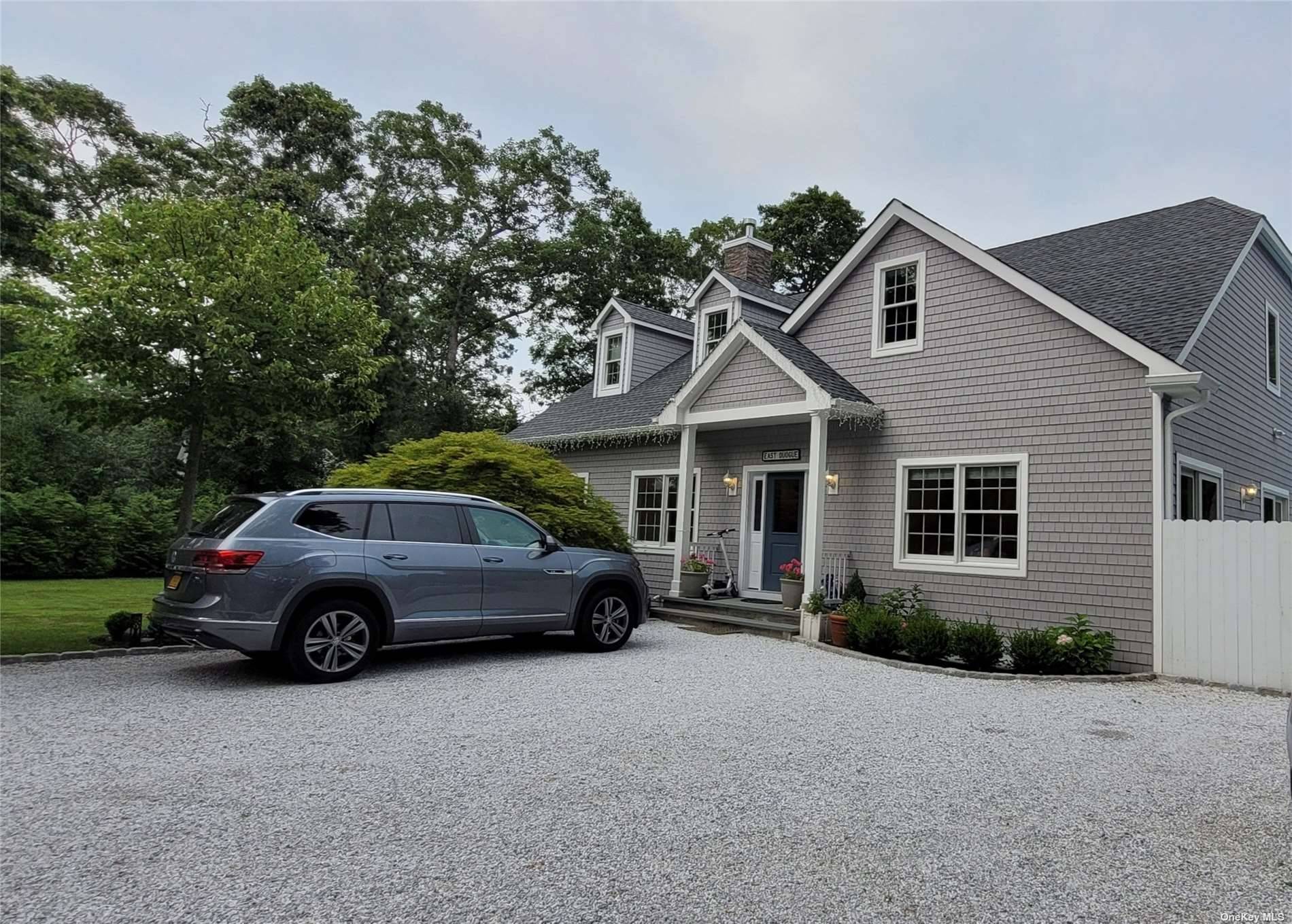 This absolutely stunning East Quogue home has it all !